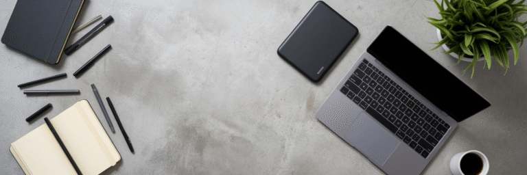 Organized creative professional's desk setup.